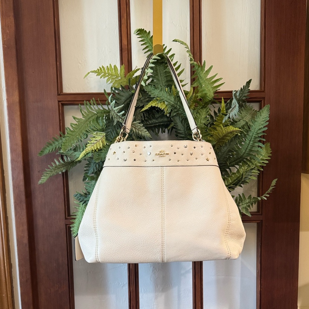 This bag is gorgeous! 
Used/new condition